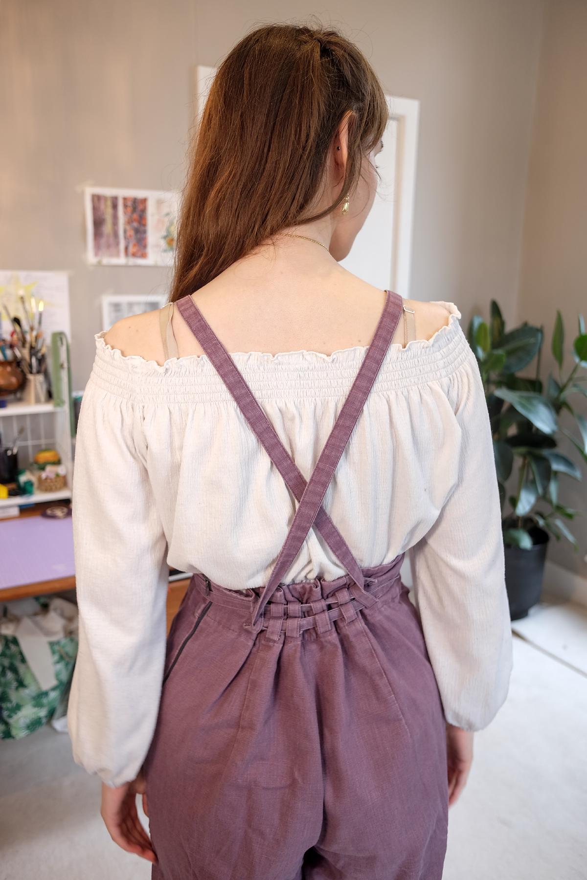 The shoulder strap design allows you to decide how much the fabric in the back should be gathered.