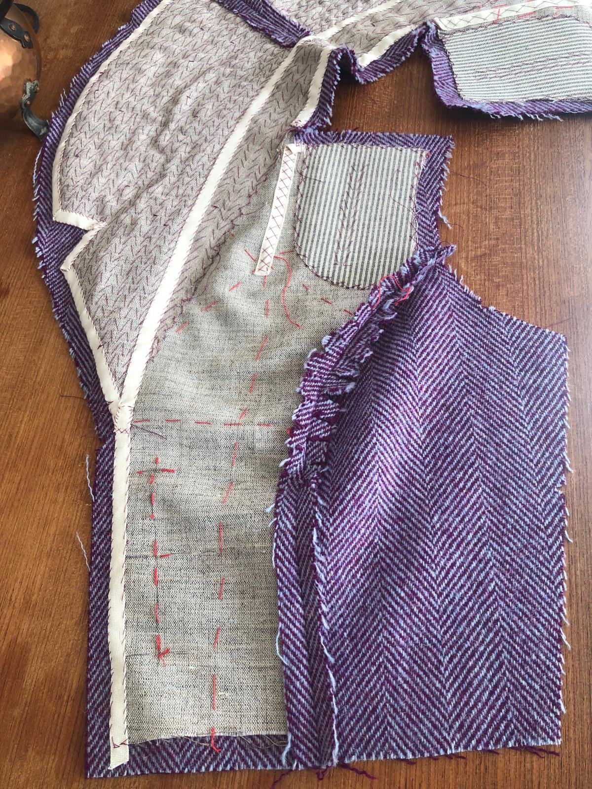 To get the collar to roll nicely, I pad-stitched hair canvas to the front bodice panels.